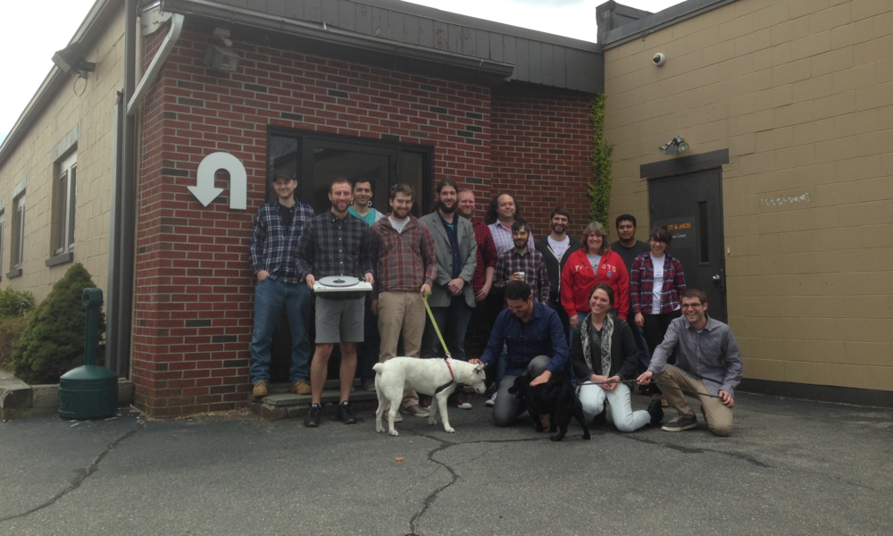 Team photo in front of the office
